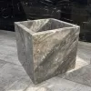 Каменное кашпо из серого мрамора